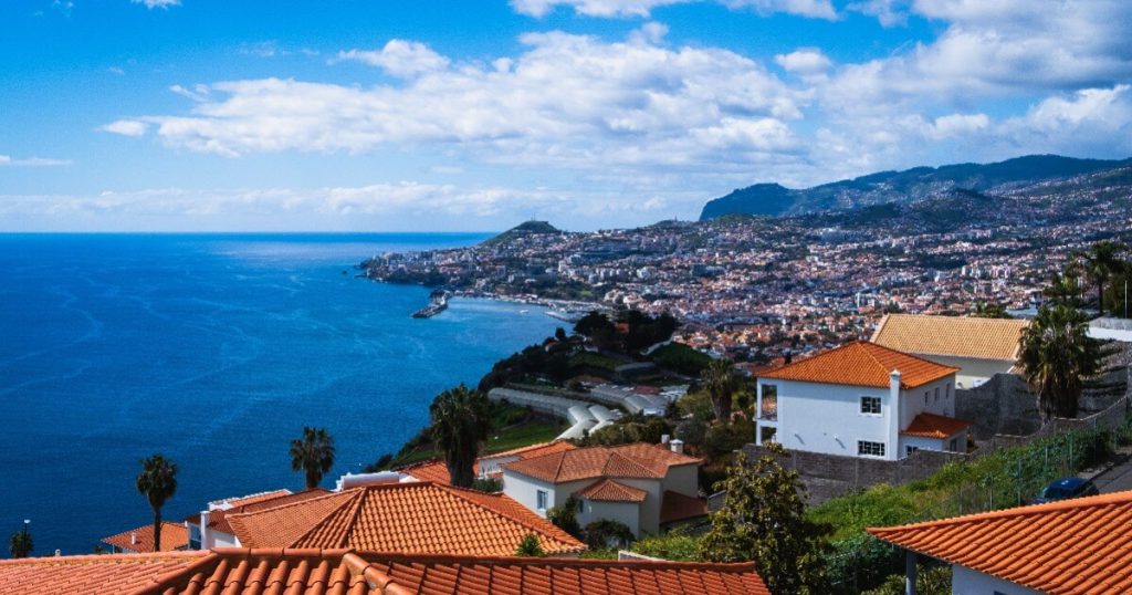 What are the main financial benefits of becoming a tax resident in Madeira?